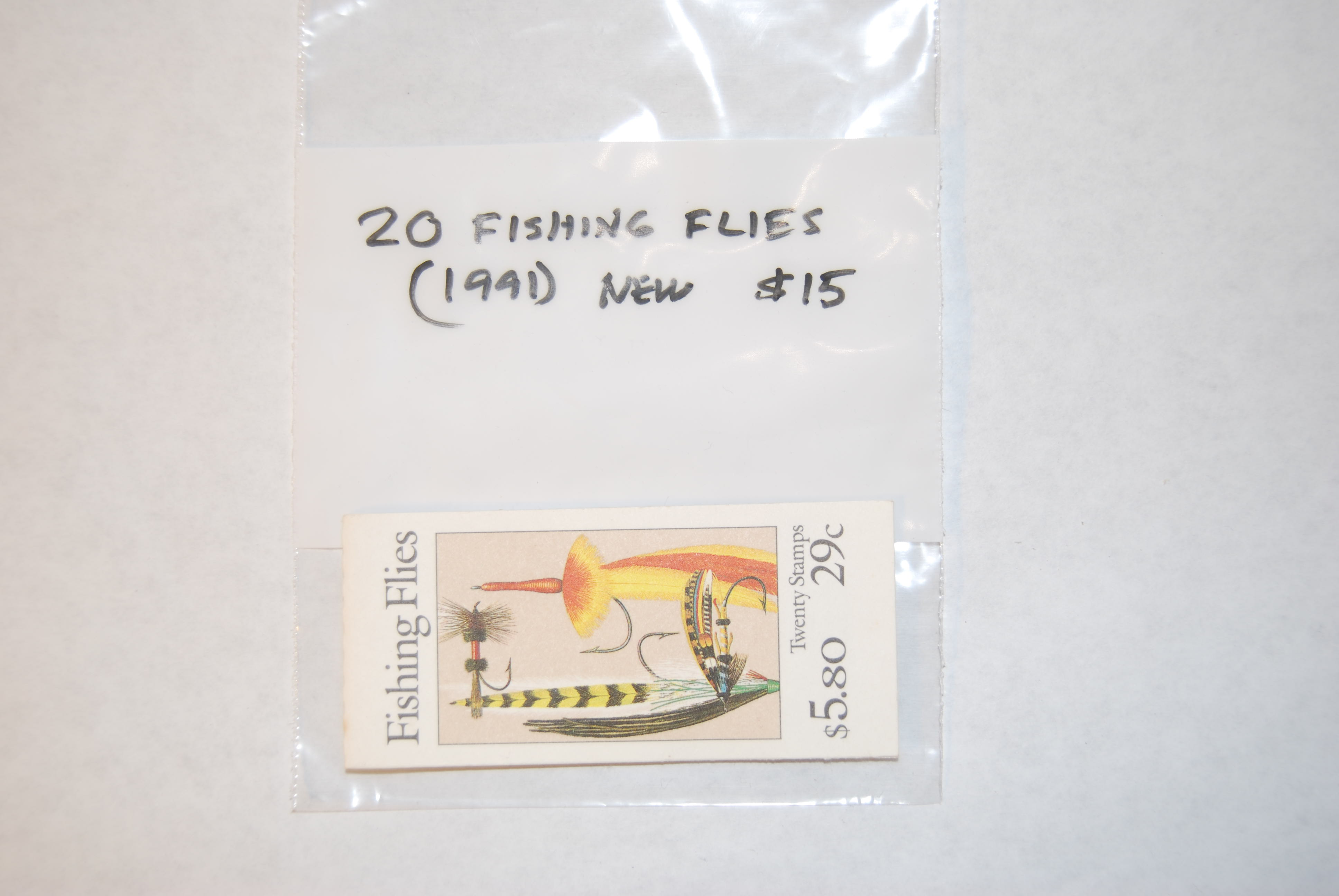Image for U.S. POSTAL SERVICE “FISHING FLIES” 20 Stamps featuring 5 different flies: Royal Wulff; Jock Scott, Apte Tarpon Fly Lefty’s Deciever, Muddler Minnow. Stamps issued in 1991.